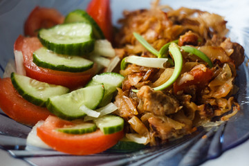 sauerkraut with meat and fresh vegetables