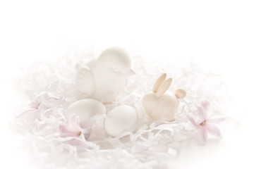 Fototapeta na wymiar Easter card with bird, eggs, rabbit, hyacinth flowers in pastel colors