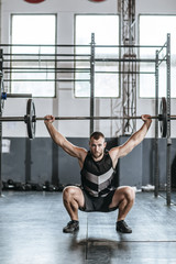 Sportsman Lifting Weights