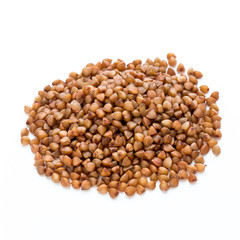 Buckwheat grains isolated on the white background.