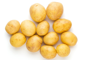 New potato and rosemarin isolated on white background close up.