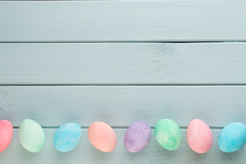 Pastel Easter eggs background. Spring greating card.