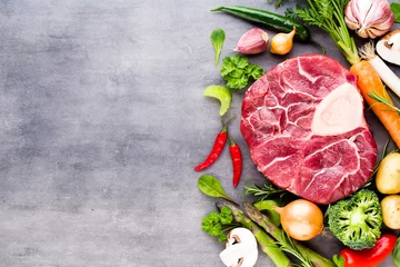 Crédence de cuisine en verre imprimé Viande Raw fresh meat Ribeye Steak with vegetables and spice.