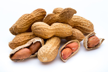 Dried peanuts on the white background.