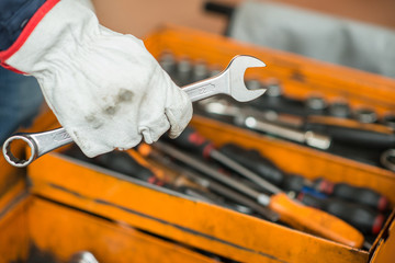 Mechanic holding a wrench