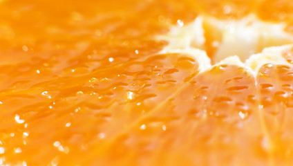 Texture in the form of a macro photo of an orange.