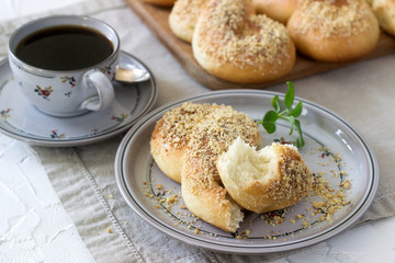 Traditional Romanian and Moldavian sweet buns in the form of eight with honey glaze and nut crumbs.