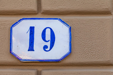 numerical tile on a stone wall background