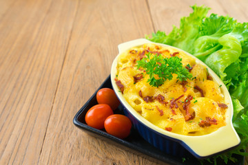 macaroni and cheese homemade food,pasta with mozzarella cheese,food styling on table.
