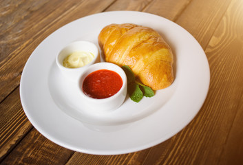 croissant on the wooden table