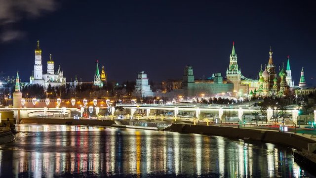 The Kremlin, St. Basil's Cathedral, Zaryadye Park and the suspension bridge in the evening, Moscow, Russia. 4K Video. Time laps
