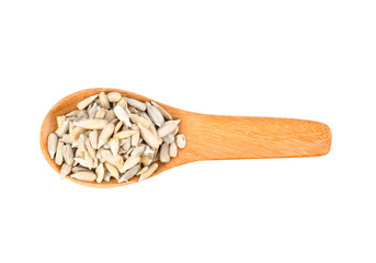 Sun flower seed on wood spoon isolated on white background