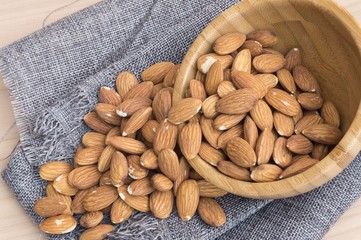 bowl overflowing with almonds