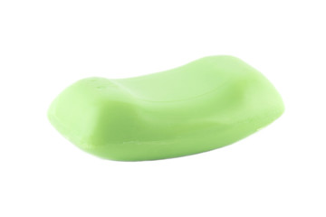 The remnant of green soap. The object is isolated on white and a clipping path is provided for easy extraction