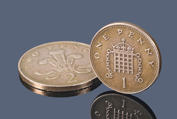British copper coins isolated on dark background