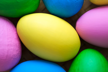 Fototapeta na wymiar Coroful easter eggs soft focus background. Easter still life