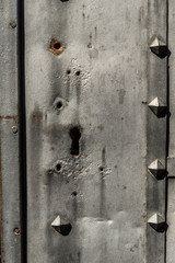 Key hole in old metal door