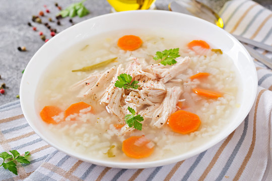 Dietary chicken soup with rice and carrots. Healthy food