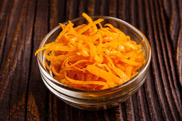 oranges and juice on a wooden background
