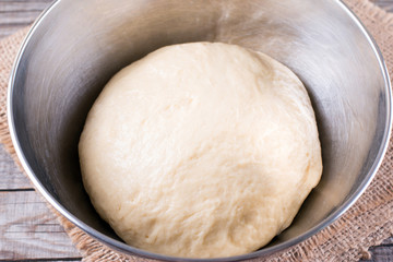 Raw dough in a bread baking dish