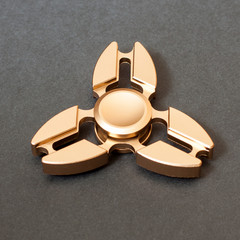 golden spinner on a black background