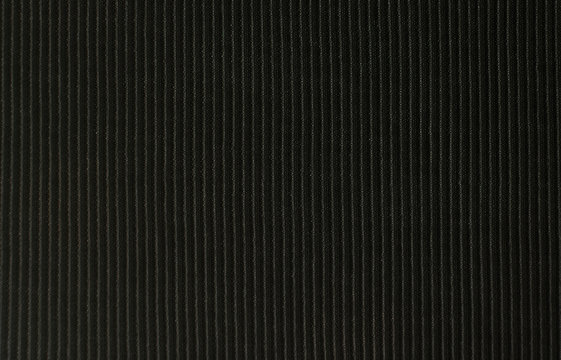 background of black cloth fabric . Photo of an abstract texture