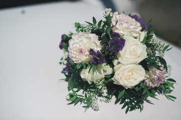 Wedding car decorated with beautiful, luxury flowers