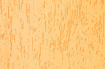 texture of a yellow putty wall