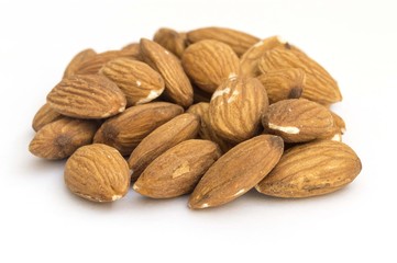 group of almonds on white background