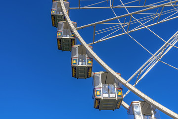 Some gondolas at a Ferris wheel at the spring fair in Mainz, Rhineland Palatinate, Germany