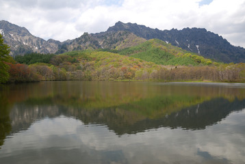 Fototapeta na wymiar lake Kagami-ike in early summer @SHINSHU / 戸隠 鏡池の新緑(パノラマビュー)