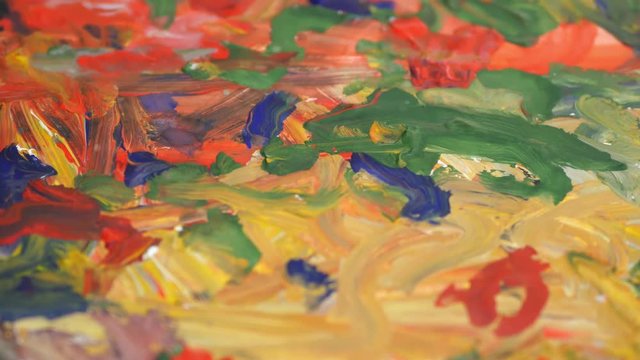 Abstract painting with paints. Brush strokes. Brush strokes. Close-up.
