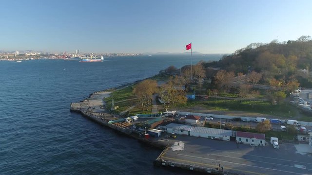 Ships floating Bosphorus blue water sunny day. Aerial drone view on sunset in Istanbul, Turkey