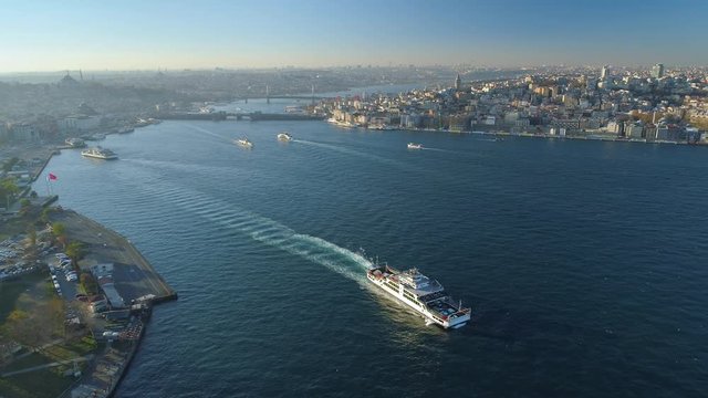 Ships floating Bosphorus blue water sunny day. Aerial drone view on sunset in Istanbul, Turkey