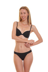 Naklejka premium Slim woman in black underwear