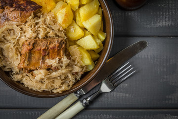 Fried ribs in sauerkraut.