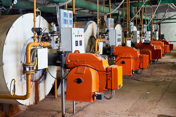 The old boiler house with orange flame
