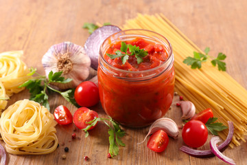 tomato sauce and raw pasta