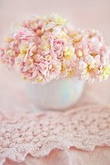 Lovely bunch of flowers .Beautiful fresh roses flowers in a box on a light background. 