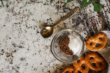 a cup of instant coffee and sugar