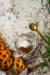 a cup of instant coffee and sugar