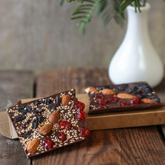 chocolate with nuts and dried fruits (organic sweets)