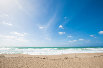 Sea view from tropical beach with sunny sky. Summer paradise beach in Nahariya, Israel.