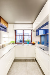 Fototapeta na wymiar Small bright white kitchen