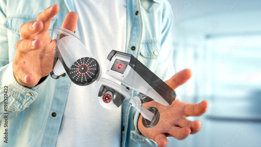 Poster businessman holding a security camera system and network connection - 3d rendering