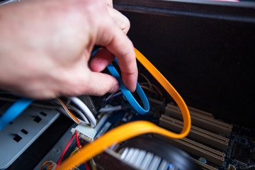 Man fixing an old desktop computer