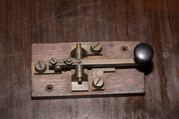 The old telegraph on wooden table