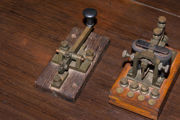 The old telegraph on wooden table