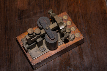 The old telegraph on wooden table