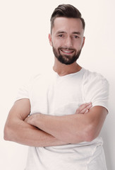 happy young man resting on a white screen